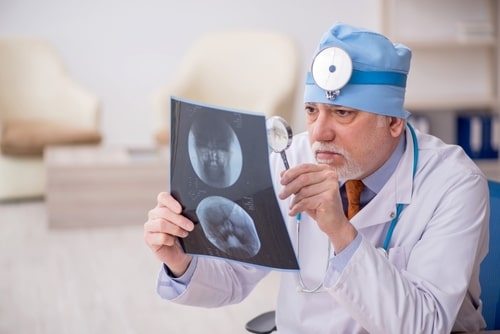 Otology & Neurotology doctor checking the x-ray
